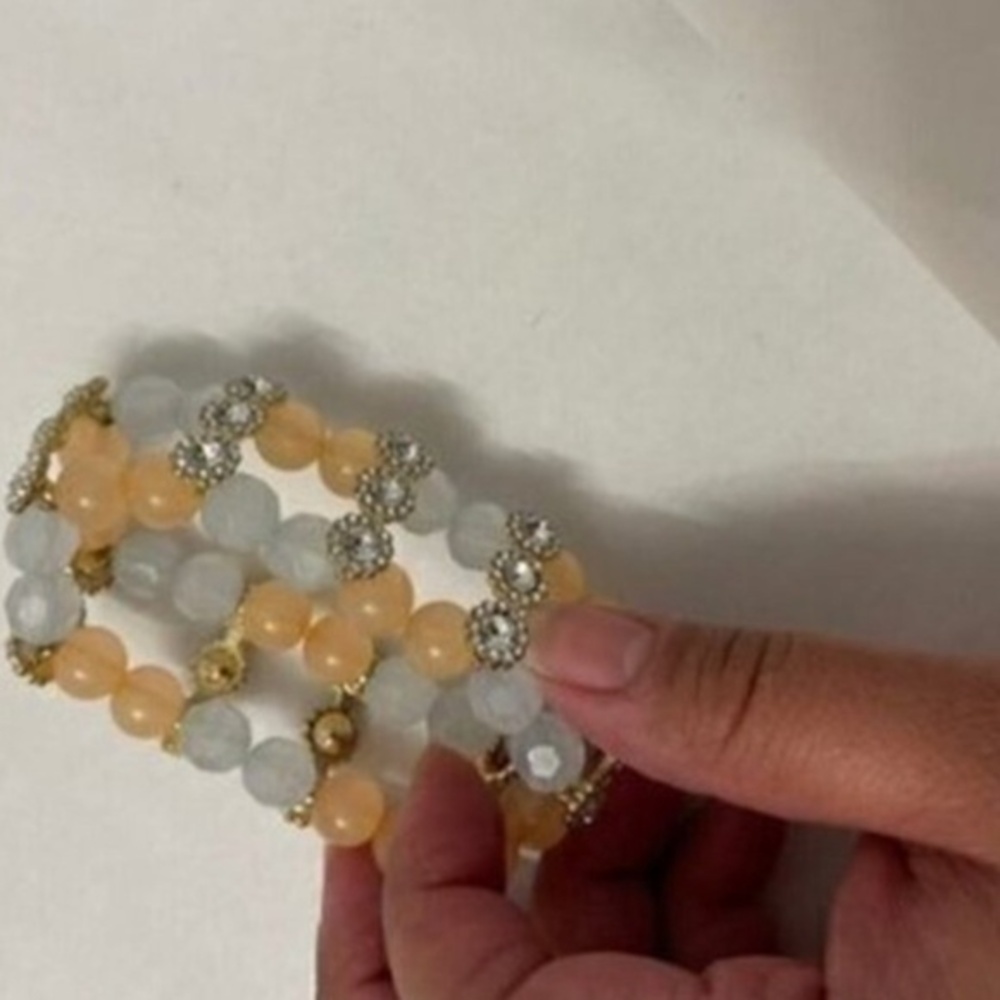 Beautiful coral gold bracelet  One size fits all It stretches